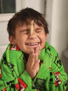 boy-with-mantis-on-face