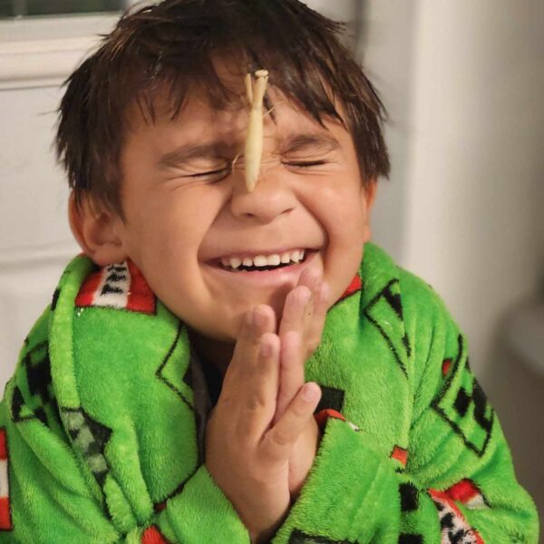 boy-with-mantis-on-face